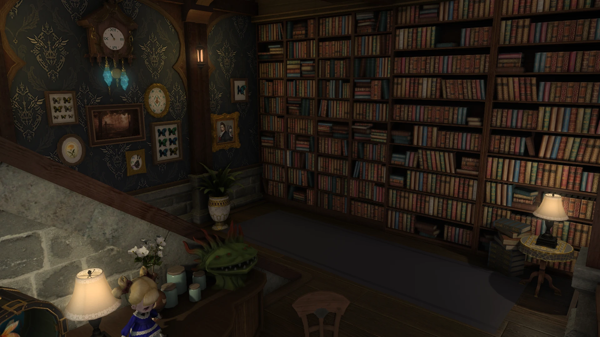 The bookshelves at the end of the stairs in the Wild Willow. The shelves are floor to ceeling, covering the back wall. The side wall has lots of paintings and other decorative items hung on it, including a kweh kweh clock. On a shelf by the stairs are various knick knacks. A doll, an onion prince flower vase, a fish bowl, and a taxidermy morbol.